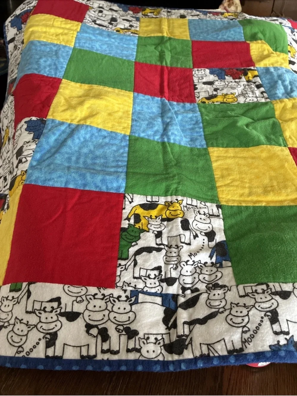 Multi-Color Patchwork Cow Print Baby Quilt - Red, Yellow, Blue, Green